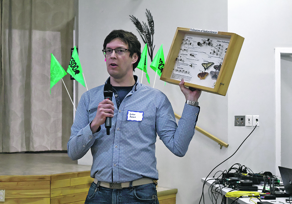 Graham Parsons, a pollinator biosecurity specialist with Saskatchewan Agriculture, shows the insect species he collected from the Saskatchewan Forage Seed Development Commission’s on-farm experiments in night spraying.  |  Becky Zimmer photo