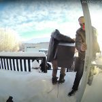 A screen shot from security video at Brad Gulka’s home shows burglars stealing a gun cabinet on Jan. 1, 2023. | Supplied photo by Brad Gulka
