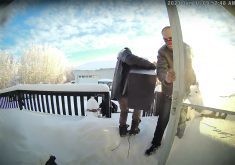 A screen shot from security video at Brad Gulka’s home shows burglars stealing a gun cabinet on Jan. 1, 2023.  |  Supplied photo by Brad Gulka
