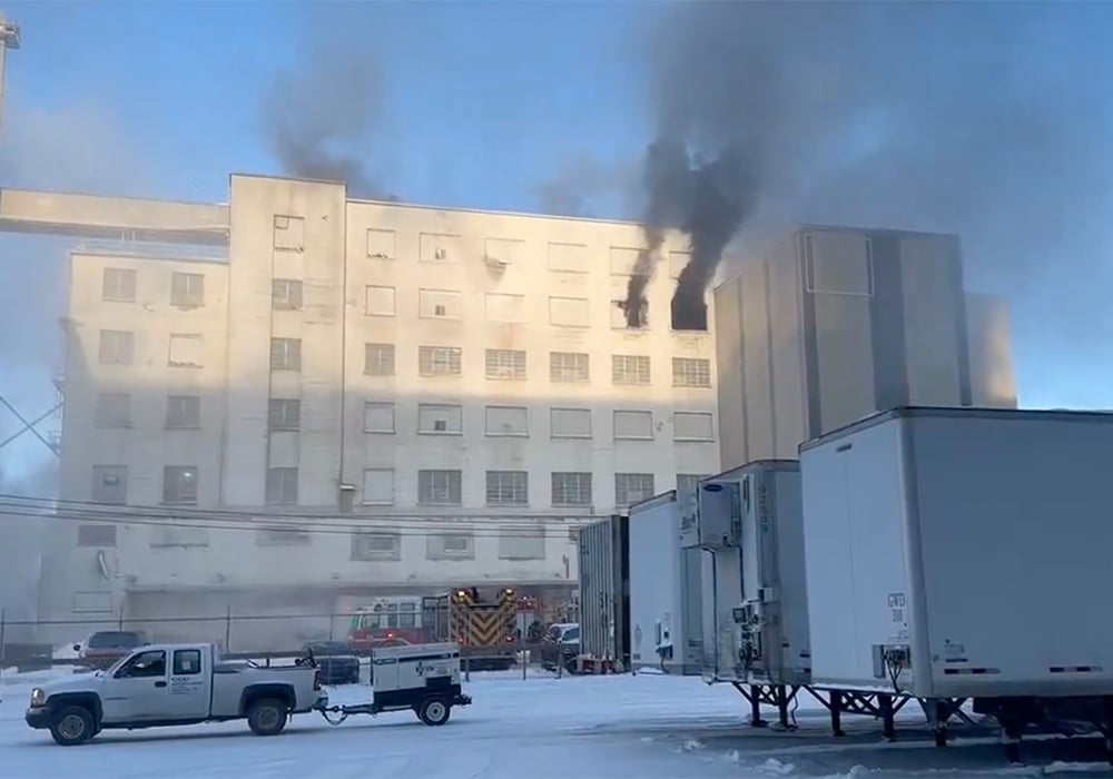 Fire crews responded to the blaze after receiving a report of the incident shortly after 9:30 a.m. Friday. | Video screencap via Twitter.com/@98COOLfm and Ryan O.