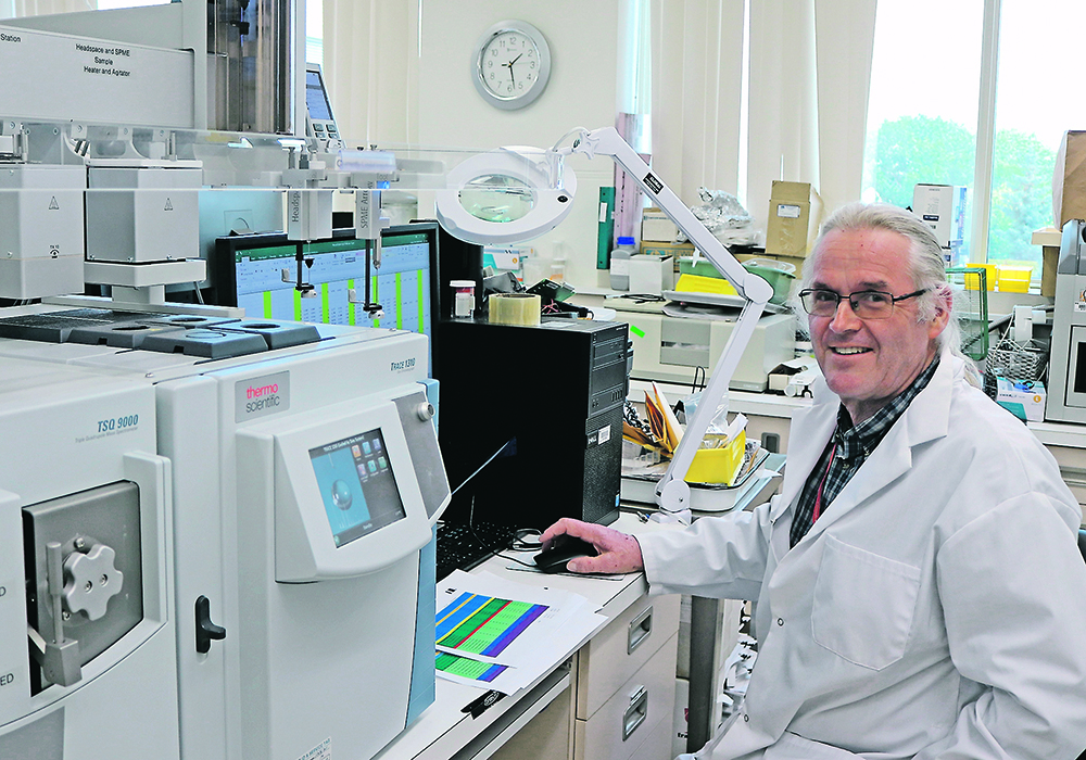 Mark Smith, an Agriculture Canada research scientist in Saskatoon, has been studying canola seeds and seedlings to understand why some varieties are more tolerant of cold soils.  |  Photo courtesy of Agriculture Canada