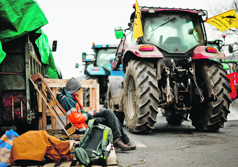 A previous draft of the European Union’s greenhouse gas emissions target had said agriculture would need to cut non-carbon dioxide emissions 30 percent by 2040 from 2015 levels, but that was removed from the final draft amidst protests by farmers angry over environmental regulations.  |  Reuters/Stephane Mahe photo