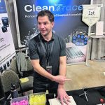 Ellery Burton of CleanTrace says it wasn’t easy to develop a dissolving ear tag that won’t fall apart while on the pig but will disintegrate in hot water. | Ed White photo