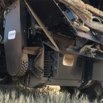Farmer adoption of the destructors, which pulverize weed seeds before they exit the combine in chaff, is slowly gaining momentum. | Screencap via debruinengineering.com.au