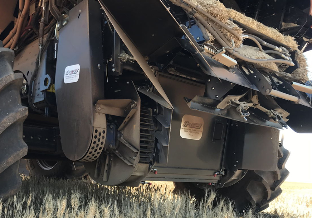 Farmer adoption of the destructors, which pulverize weed seeds before they exit the combine in chaff, is slowly gaining momentum. | Screencap via debruinengineering.com.au