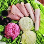 A traditional cold plate will have three flavours of potato salad, cold sliced meats, other salads and homemade pickles. | Sarah Galvin photo