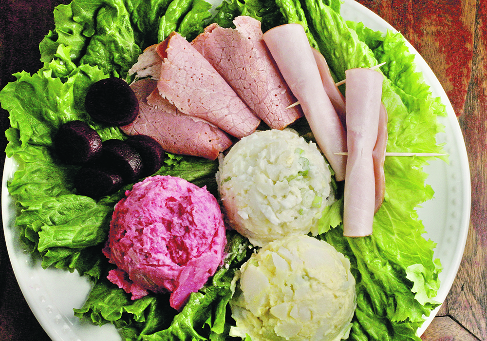 A traditional cold plate will have three flavours of potato salad, cold sliced meats, other salads and homemade pickles.  |  Sarah Galvin photo
