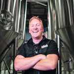 Graham Sherman stands in his brewery, once a distant dream thanks to Alberta’s liquor laws. | Photo supplied by Tool Shed Brewing Company