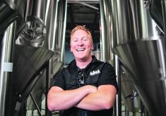 Graham Sherman stands in his brewery, once a distant dream thanks to Alberta’s liquor laws.  |  Photo supplied by Tool Shed Brewing Company