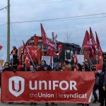 Unifor said it "safely" stopped the train at "a rail crossing at a public roadway near CN’s Winnipeg yards" where close to 100 Unifor members and supporters were holding a demonstration. | Screencap via twitter.com/UniforTheUnion