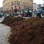 Czech farmers, in their third protest since mid-February, rolled into Prague early March 7 in hundreds of tractors, lining streets and a river road leading to the government offices, bringing traffic to a standstill in several spots. Police said farmers dumped manure in front of government headquarters, leading to one arrest. | Reuters / Eva Korinkova photo