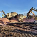 The train was hauling 200 freight cars of potash when 27 of them derailed Oct. 16, 2021. Many of the cars were breached, but there were no injuries and no dangerous goods were involved. | Transportation Safety Board of Canada photo
