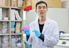 Professor Jinkee Hong, who led the work to develop hybrid beef rice using cow muscle and fat stem cells, holds a bowl of the finished product in a laboratory at Yonsei University in Seoul, South Korea.  |  Reuters/Kim Soo-hyeon photo