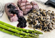 Bison steak with a saskatoon berry jam glaze, wild rice and asparagus were all foods that helped increase cash flow on many farms during the 1980s. | Betty Ann Deobald photo