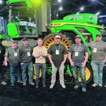 Jordan Lindgren (fourth from right) and his farm team were invited to the Commodity Classic Farm Show in Texas to attend the public debut of the 9RX tractor. He and others in a focus group were involved in helping John Deere design it. | Jordan Lindgren photo