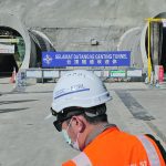A worker stands at the construction site of East Coast Rail Link near Bentong, Malaysia, part of China’s Belt & Road initiative. While the massive trade infrastructure endeavour may be slowing, analysts believe what has been built so far has eaten into Canada’s global market share. | Reuters/Hasnoor Hussain photo