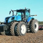 Canadian sales of two- and four-wheel-drive tractors and combines were up in March. | New Holland photo