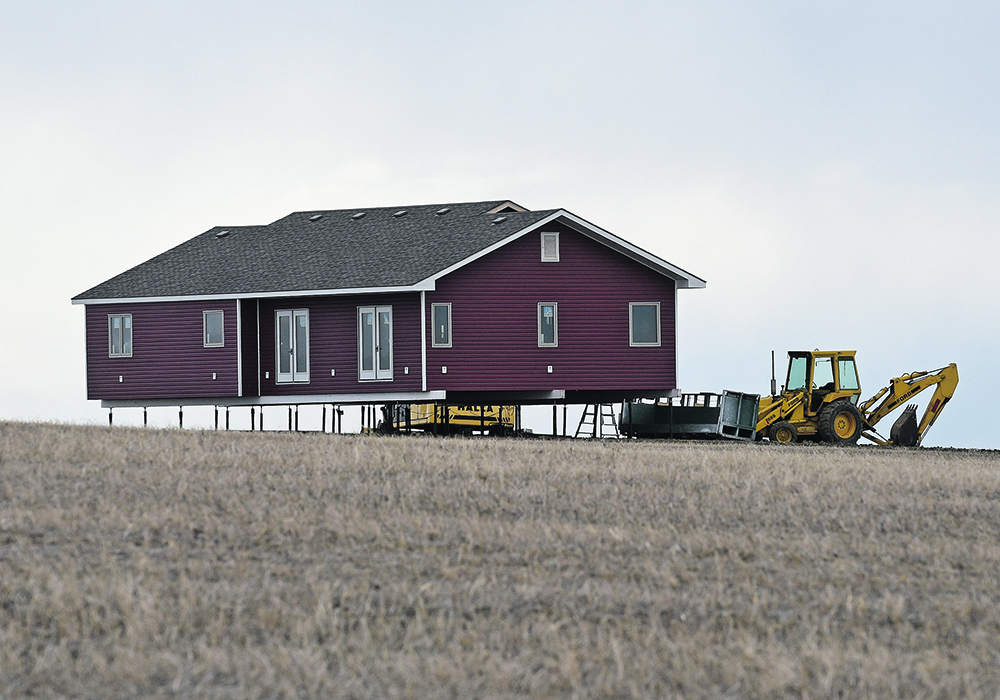 Producers and agriculture companies worry that new housing requirements for temporary foreign workers will require them to maintain empty houses.  |  File photo
