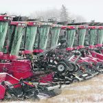 An FCC economic outlook report expects weak grain and oilseed prices will dampen demand for new harvesting equipment in Canada in 2024 by up to 20 per cent compared to last year. | Scott Garvey photo