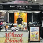 Dalton Dosch mans the family’s Wheat Crunch trade show display booth. | Dosch family photo