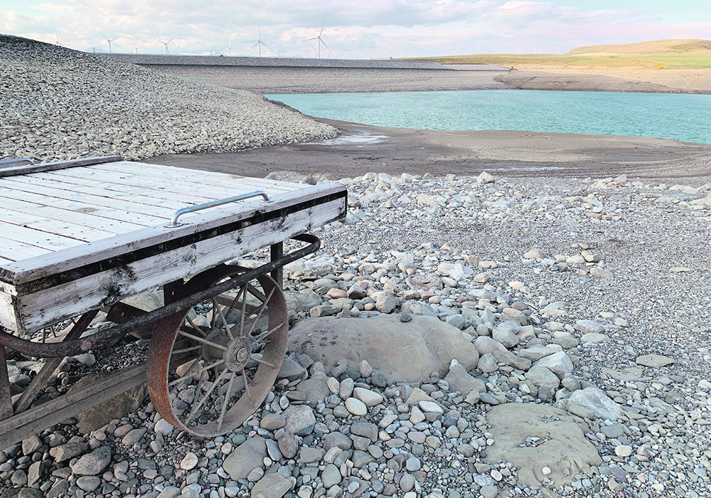 Mountain snowpack is crucial for filling reservoirs in southern Alberta. Water levels at the reservoirs were precariously low last year, as shown in this photo of the Oldman Dam reservoir boat dock in September.  |  File photo