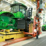 The cuts will reduce “overlap and redundancy in roles and responsibilities,” Deere disclosed in a filing. | Screencap via deere.com