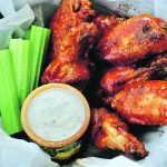 These chicken wings remain crispy even after freezing with the buffalo sauce on them. | Sarah Galvin photo