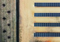A drone view shows sandy soil eroding from the base of solar panels on Indiana farmland Dave Duttlinger leased to Dunns Bridge Solar LLC.  |  Reuters / Jim Vondruska photo
