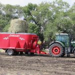 A Total Mixed Ration mixer is loaded during the mixer demo at AIM 2023. | John Greig photo