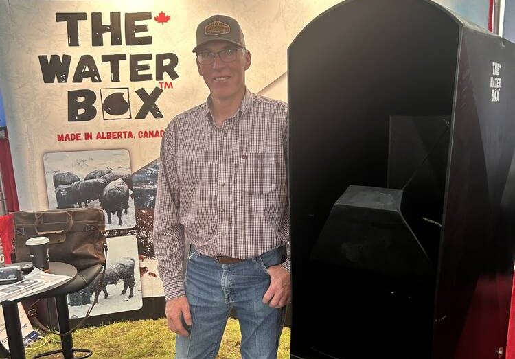 The Water Box is a livestock waterer producers can insert through the ice of a dugout, slough or slow-moving creek. Once frozen in place, cattle can flip a lid near the ice surface and drink their fill. | Lisa Guenther photo