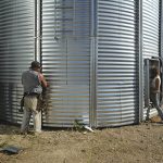 Paul Brisebois, senior vice president for Canada for grain storage manufacturer AGI, explained that as farms have increased in size, their storage requirements now mean far greater quantities of a single crop, whether it be canola or wheat. This means higher capacity, flat-bottomed bins. | File photo