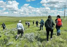 Visitors tour the Cave Pasture at Swift Current, Sask. The property is owned by the Nature Conservancy of Canada and lies right next to the city limits. | Karen Briere photo