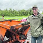 Jeff Veenstra stands next to equipment on his 20-acre operation, Wild Earth Farms, in the Rural Municipality of Springfield. | Don Norman photo