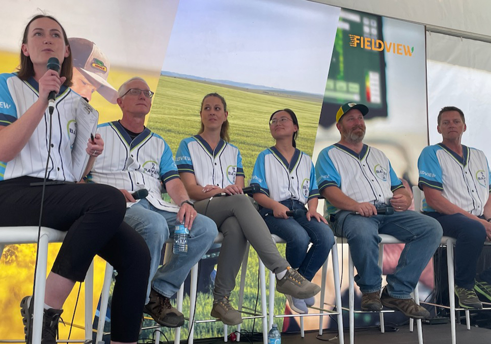 Bayer's "canola dream team" at Ag in Motion (l-r): panel moderator and DeKalb campaign marketing lead Nikki Vercaigne with Dale Burns, Liz Simpson, Xuehua Zhang, Tim Darragh and Tim Gardner. | Dave Bedard photo