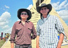 Kobe Wolf Child, left, and Warren Many Grey Horses, who work in agriculture on southern Alberta’s Blood Indian Reservation, recently attended the Ag in Motion farm show.  |  Ed White photo
