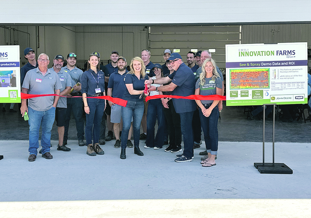 Ribbon cutting to celebrate the opening of EMILI’s Innovation Farms Centre. | Don Norman photo
