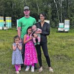 Jason, Songshan, Aaron (in Songshan’s arms) Adelle, front left, and Anna Flint on their farm near Paradise Valley, Alta. | Joan Mudryk photo