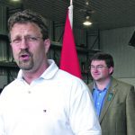 Federal agriculture minister Chuck Strahl, then the federal agriculture, announces a new program to compensate farmers for flooded farmland on a farm near Ste. Adolphe, Man., in the spring of 2006. | File photo