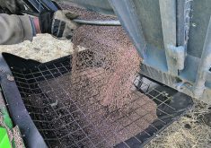 Safe grain handling practices include using caution around all moving equipment such as PTOs and augers and ensuring all protective guards and screens are in place before operating. | File photo