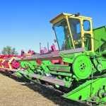 A group of eight vintage combines, including a John Deere 95, was on hand to harvest grain. | Scott Garvey photo
