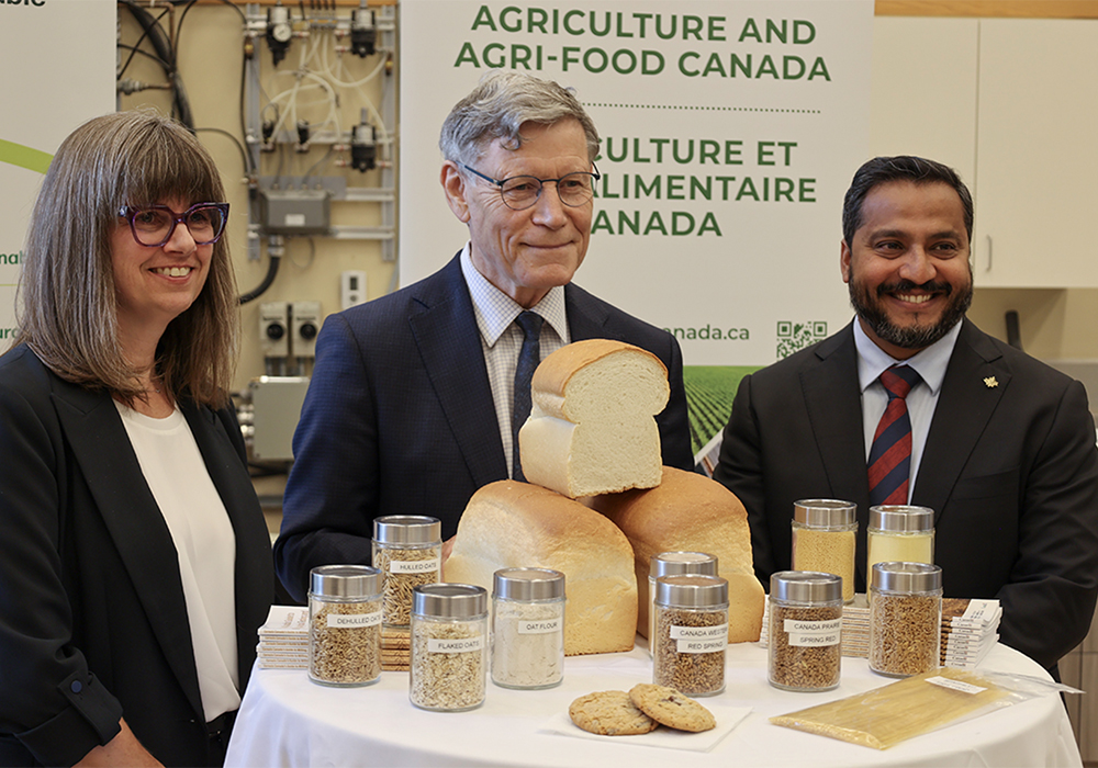 Elaine Sopiwnyk, Vice President, Technical Services, Cereals Canada; Terry Duguid, Parliamentary Secretary to the Prime Minister and Special Advisor for Water and Member of Parliament for Winnipeg South; and Dean Dias, CEO, Cereals Canada attend Tuesday’s funding announcement. | Cereals Canada photo
