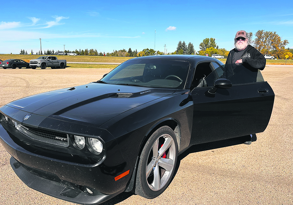 When he’s not operating a silage harvester or limo, Kevin Sustrik can be found behind the wheel of his Dodge Challenger.  |  Mary MacArthur photo