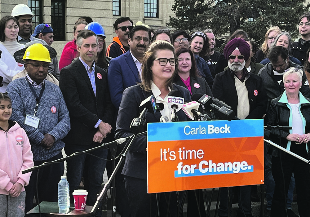 Saskatchewan NDP leader Carla Beck speaks at an event outside the Legislative Building in Regina last week. |  Karen Briere photo