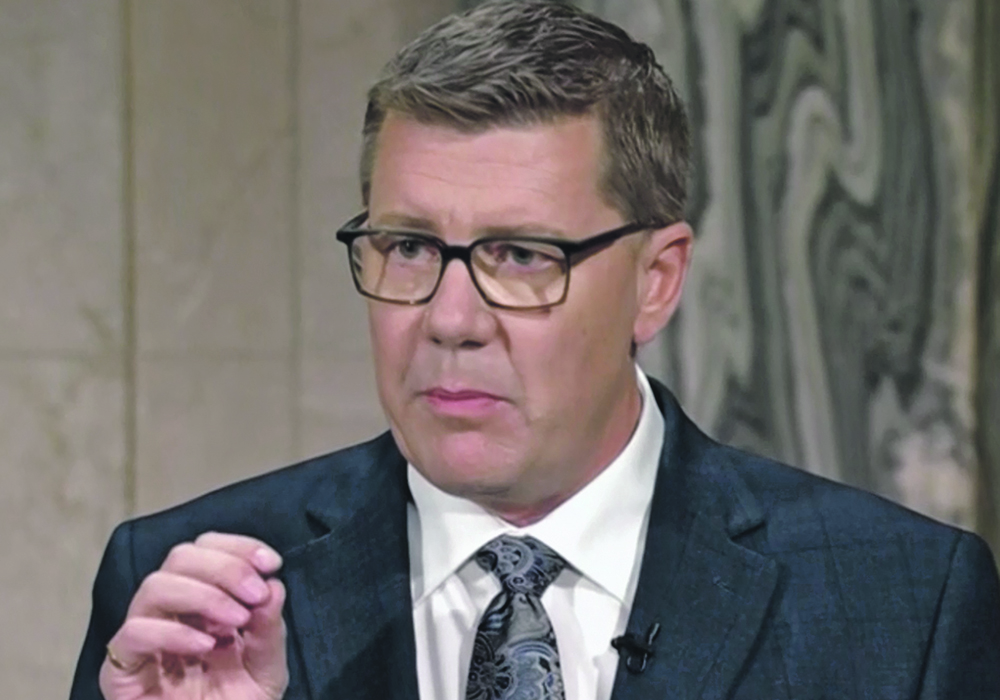 Scott Moe, leader of the Saskatchewan Party, participates in last week’s leaders debate with NDP leader Carla Beck during the provincial election campaign.  |  Screen capture