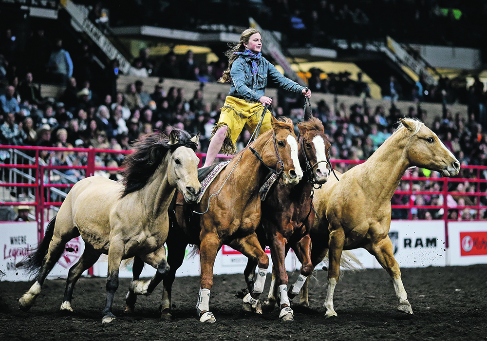 Piper Yule rides her team of four horses at the 2023 Canadian Finals Rodeo. The 14-year-old cowgirl will have her own show on The Cowboy Channel. | Photo courtesy of Covy Moore