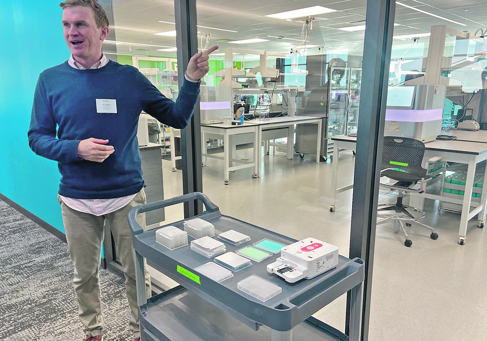 Tim Kelliher, head of crop, trait and technology discovery with Syngenta Seeds, talks about how new genetic technologies are applied to seed selection during a recent tour of a Syngenta facility near Malta, Illinois.  |  John Greig photo