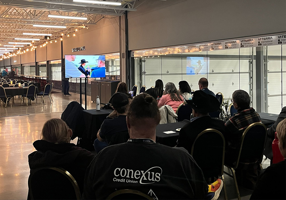 Launch attendees watch the first episode of the Western Producer’s documentary series, Welcome to the Farm Show, which was shown during Canadian Western Agribition. | Melissa Jeffers-Bezan  photo