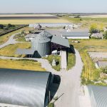 There are many similarities to farms in the Ukraine and Western Canada, from the buildings and equipment to production strategies and crops. This is an aerial photo of a Ukrainian farm. | Ihor Pavliuk photo