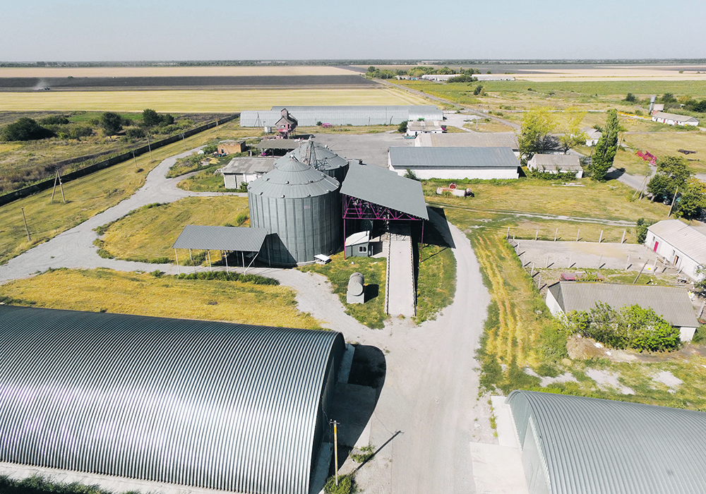 There are many similarities to farms in the Ukraine and Western Canada, from the buildings and equipment to production strategies and crops. This is an aerial photo of a Ukrainian farm. | Ihor Pavliuk photo