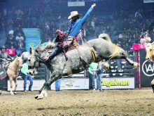 Nicholas Patterson of Blackfaulds, Alta., shows his form riding Monsters Inc. | John Greig photo